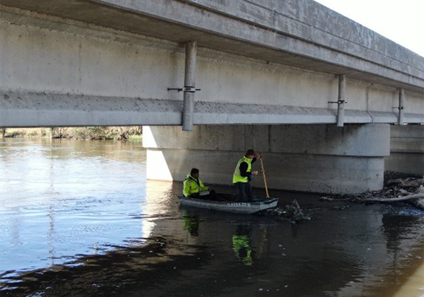 Heger performing depth checks at a bridge in Lemont, IL